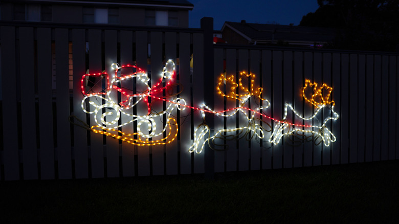 Santa riding his sleigh with two reindeers in the front