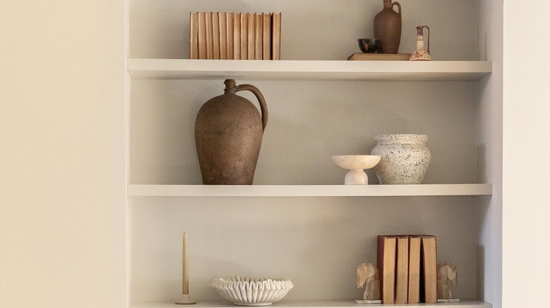 neutral items on wooden shelves