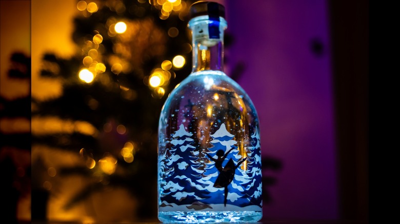 liquor bottle snow globe