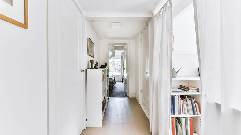 room with white curtain divider