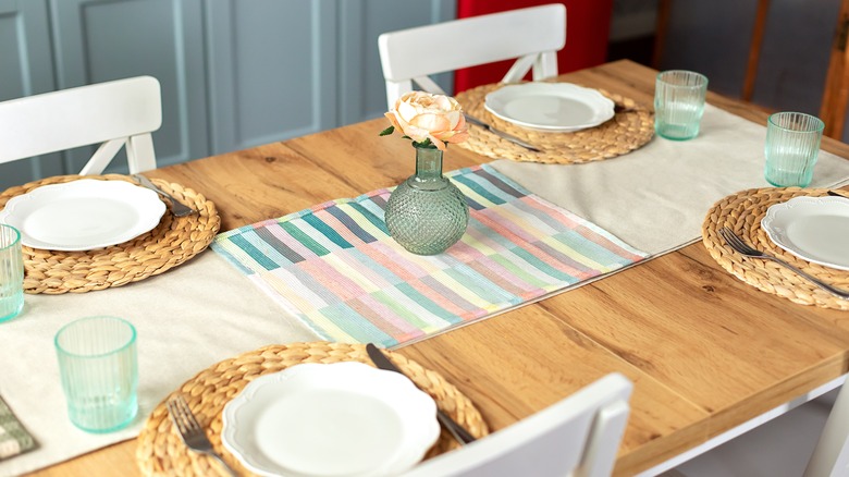 table with pastel striped runner