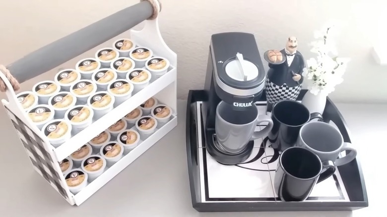 K-cup organizer beside coffee machine