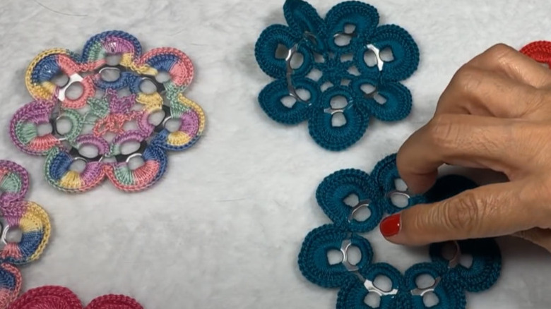 Hand crafting Crochet and soda tab coasters