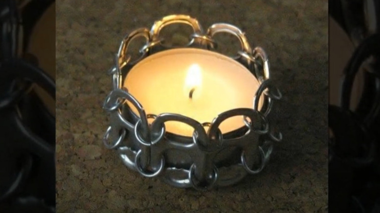 tea light in a soda can tab holder