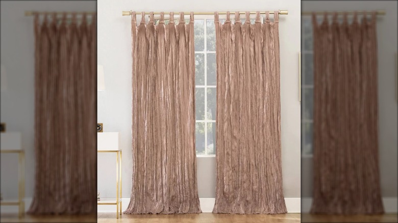 Rose velvet crinkle curtains on window