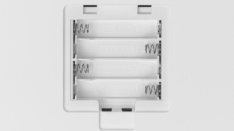 white plastic battery compartment