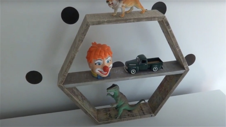 toys on hexagon pallet shelf