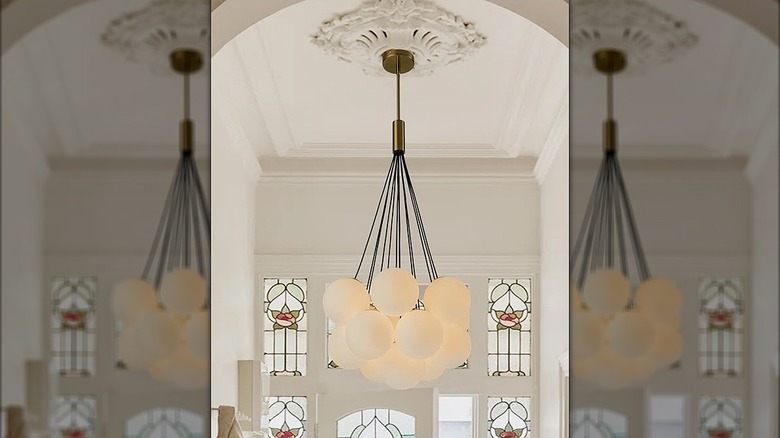 Cluster bubble chandelier hanging from a ceiling