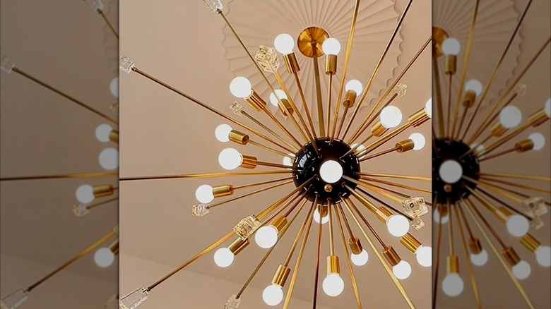 Gold Sputnik chandelier hanging from the ceiling