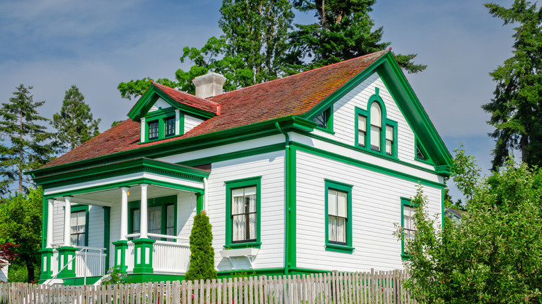 Bright green trim on white house