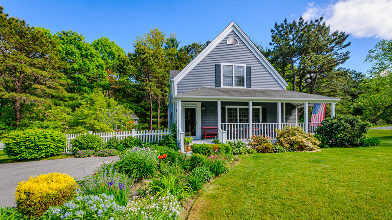 Gray house with dark gray shutters