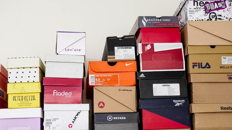 Stack of shoeboxes on wall