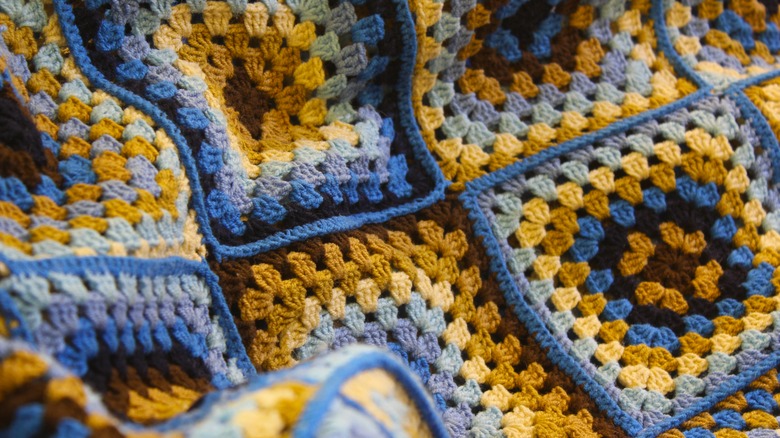 blue and yellow granny square blanket