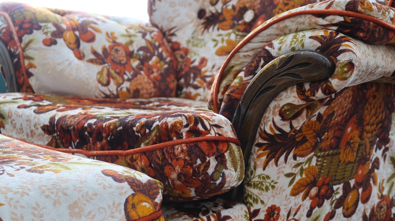 orange floral patterned armchair