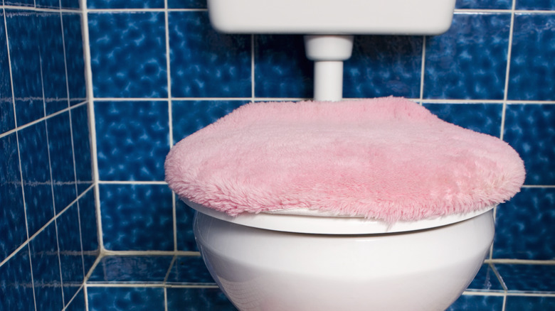 pink toilet lid cover