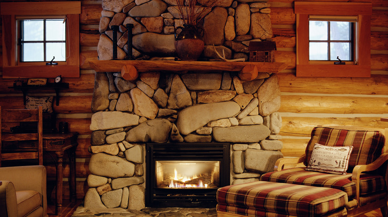 cabin with stone fireplace