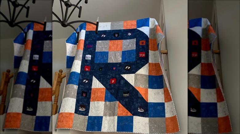 quilt with repurposed hat logos