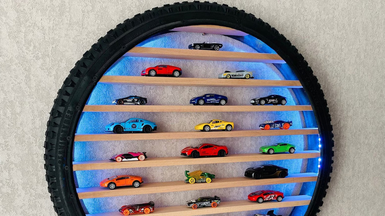 bike wheel toy car shelf