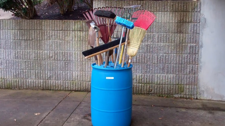 Gardening tools in barrel