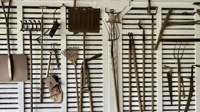 Gardening tools on wall