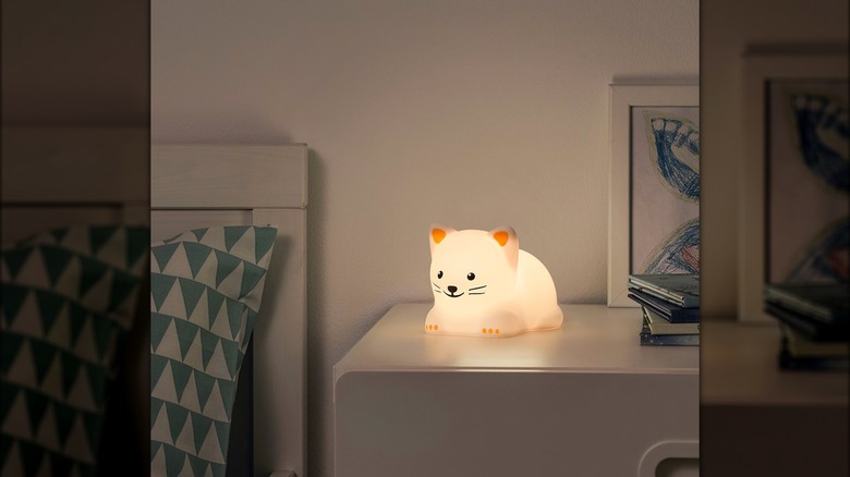 Cat Night Light on bedside table