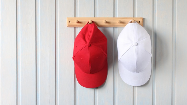 hats on hook rack