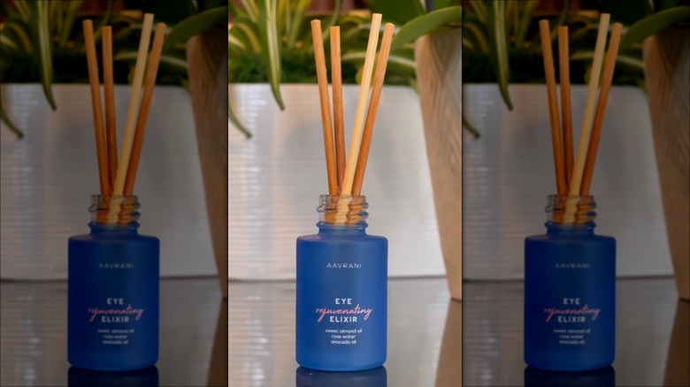 reed diffuser in blue bottle