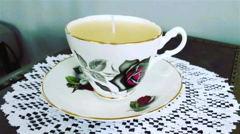 teacup candle on doily