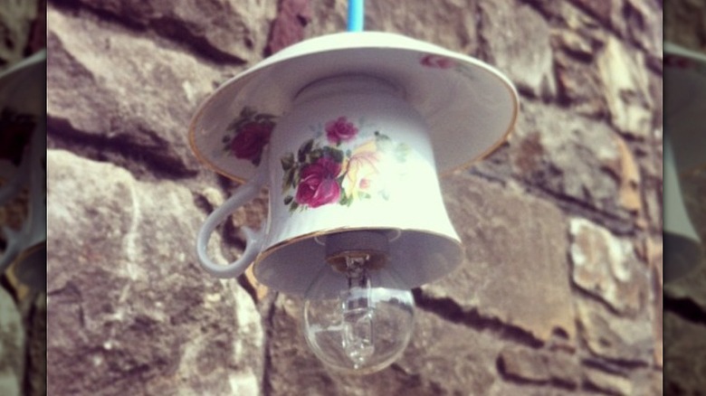 white teacup hanging light