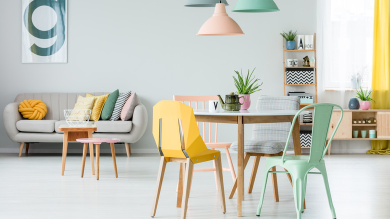 pastel chairs around a table