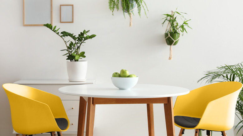 yellow chairs in white room