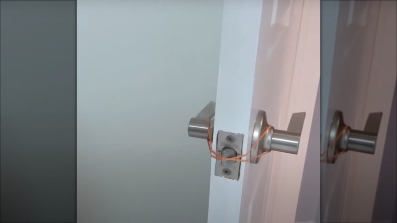 rubber band over door latch