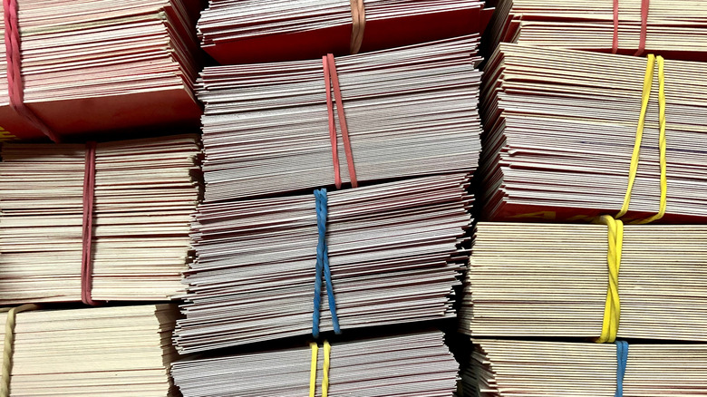 stacks of cards with rubber bands