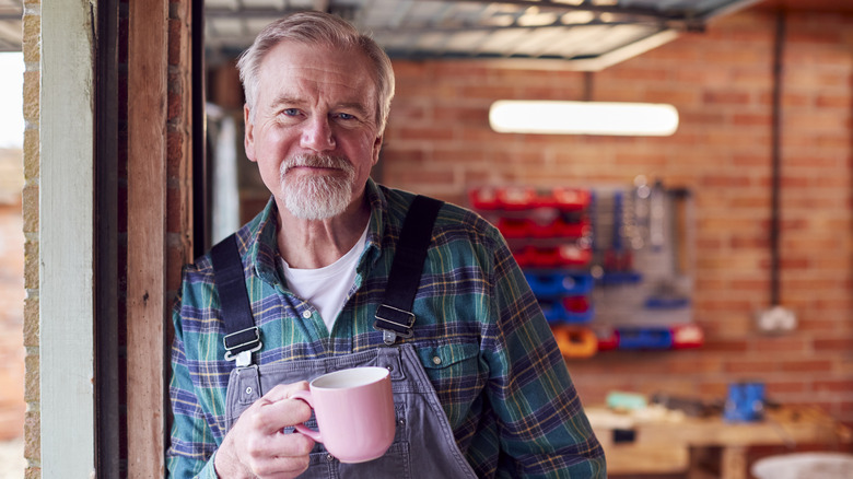 man enjoying cup of tea