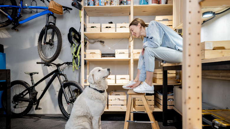 woman and dog with garage storage