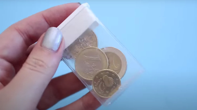 coins in Tic Tac container