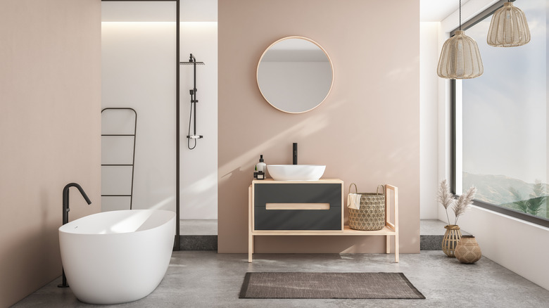 A bathroom with beige accent walls