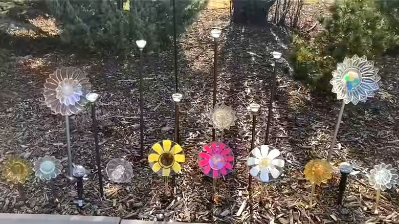 plate flower decor in garden