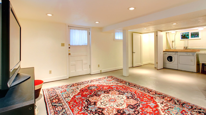 Red rug in basement