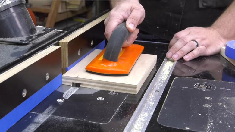 Routing a dado in a board using painter's tape