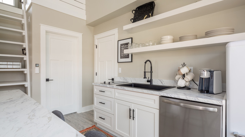 White kitchen with open shelving