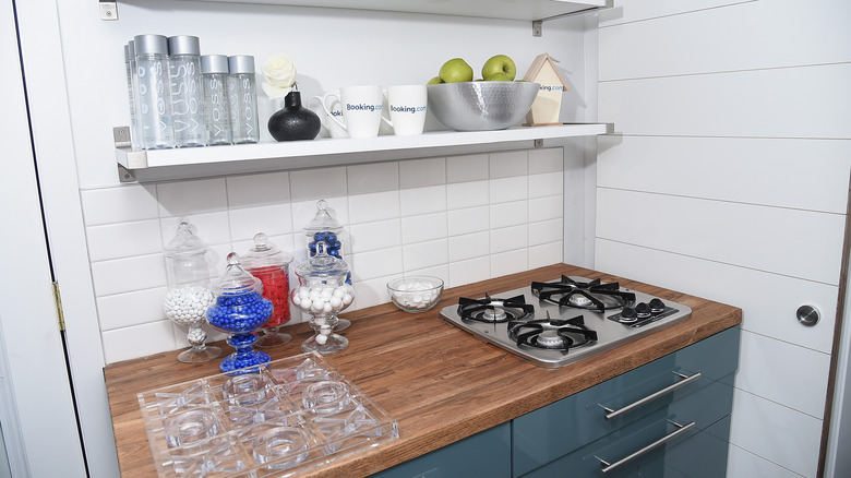 Small kitchen with shelving