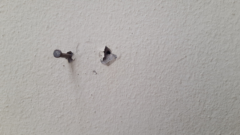 nail hole in wall