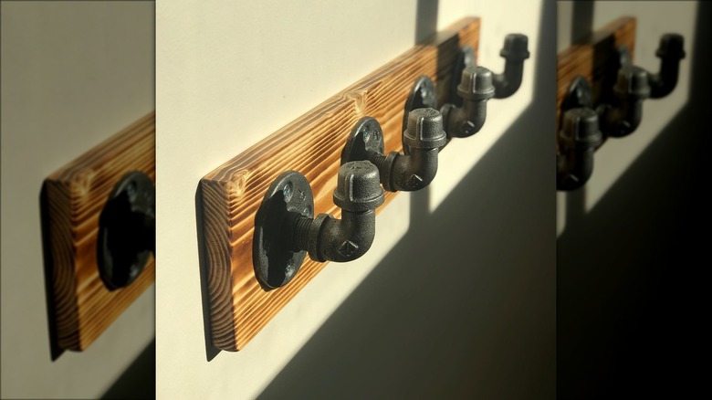 industrial coat rack on wall