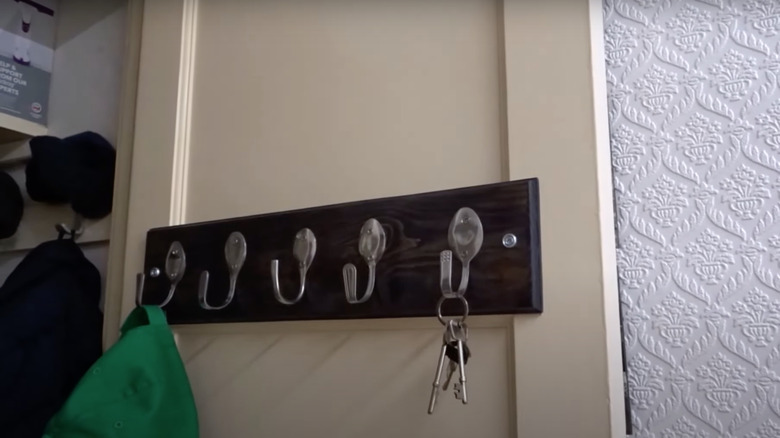 spoon and wood coat rack