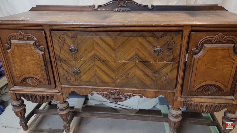 Scuffed antique sideboard