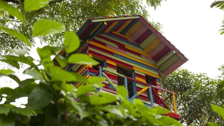 treehouse painted rainbow colors