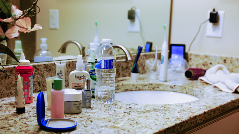 clutter on bathroom counter