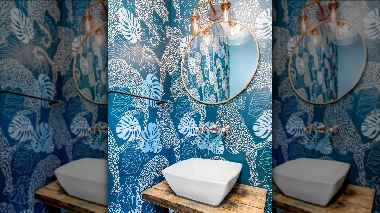blue patterned wallpaper in bathroom