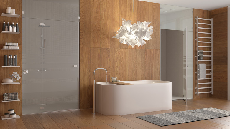 cloud chandelier above bathtub